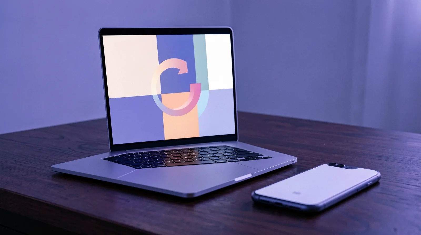 Computador portátil com painel abstrato de uma seta circular de retorno e celular ao lado sobre uma mesa de escritório